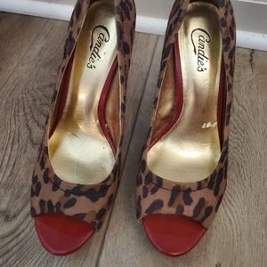 Candies. Cheetah print/red heels.